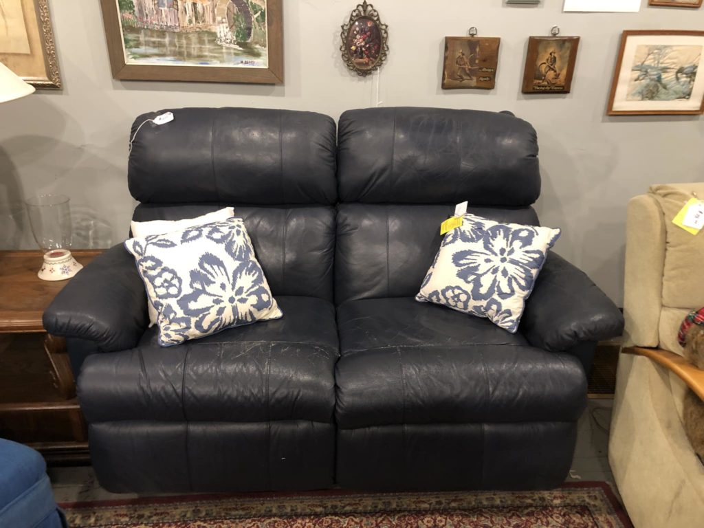 Blue leather Couch that Reclines