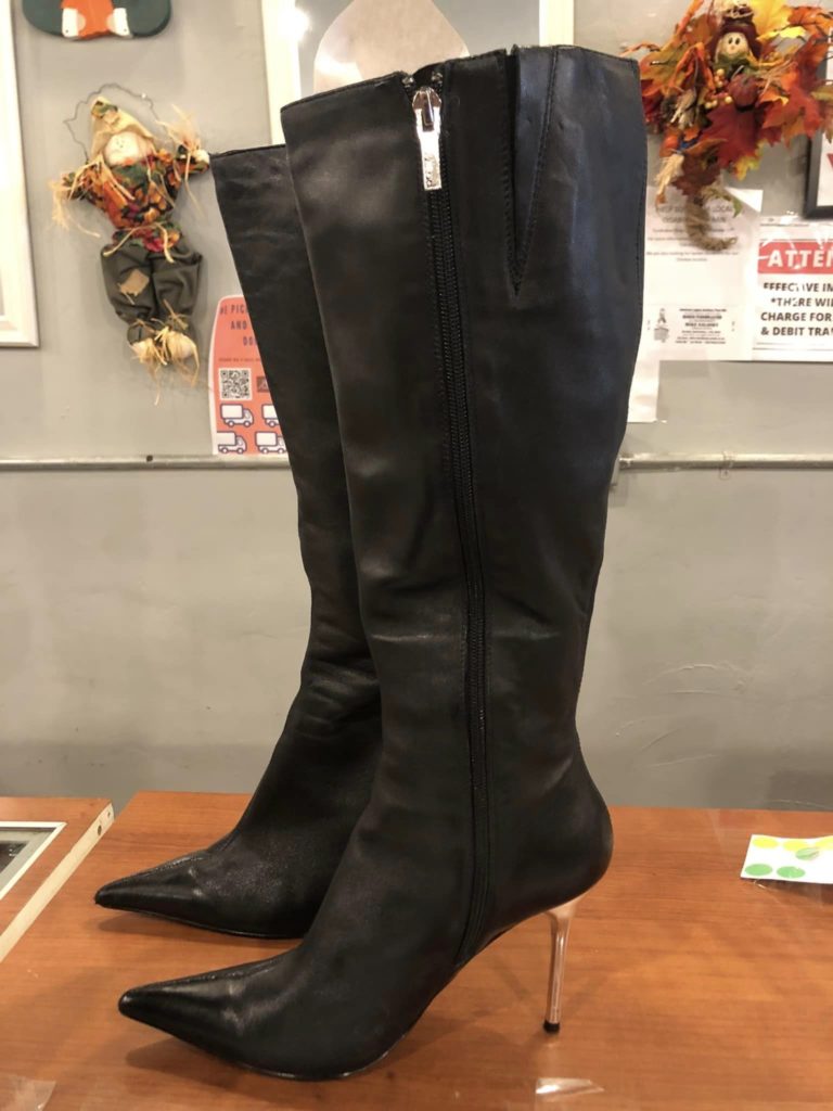 Spike heel tall black boots